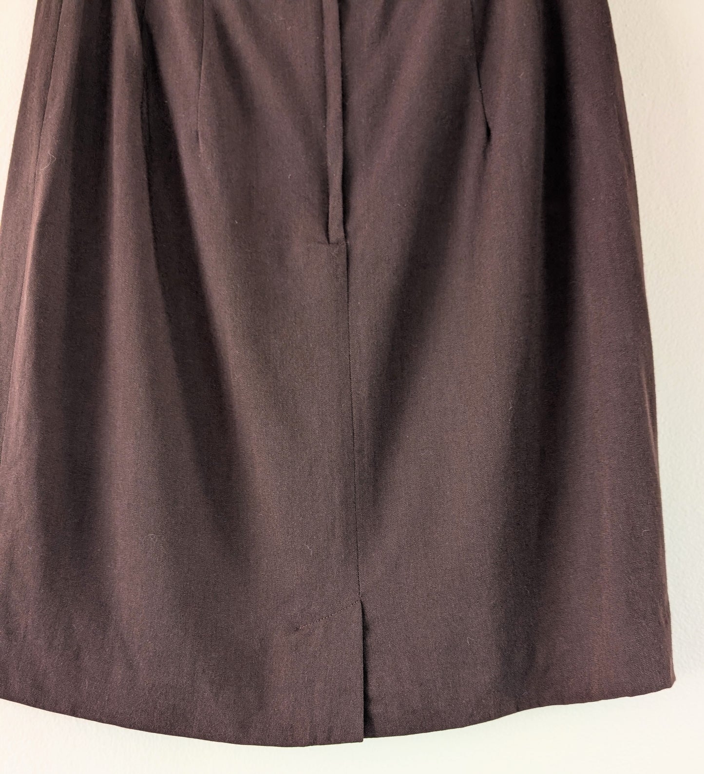 Brown skirt on a beige background