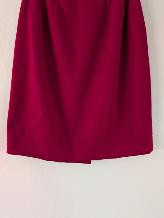 red wool pencil skirt against white background